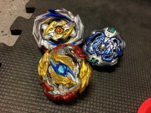 deck of three beyblades imperial odin archer hercules and lord longinus