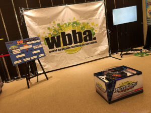 beyblade burst g3 tournament finals set up with backdrop stadium and tournament bracket board