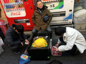 two players preparing for beyblade match