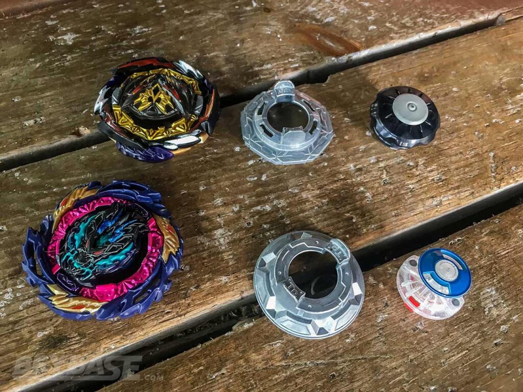 disassembled beyblade burst combos: dynamite f gear belial giga drift and vanish bahamut tapered zone dash plus z