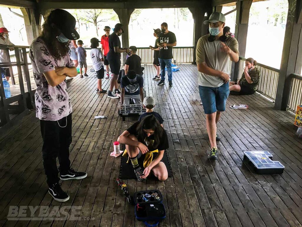 group of people inside shelter during beyblade tournament