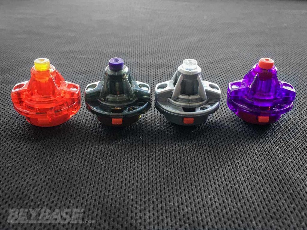 silver, black, purple, and red beyblade burst xtreme dash drivers
