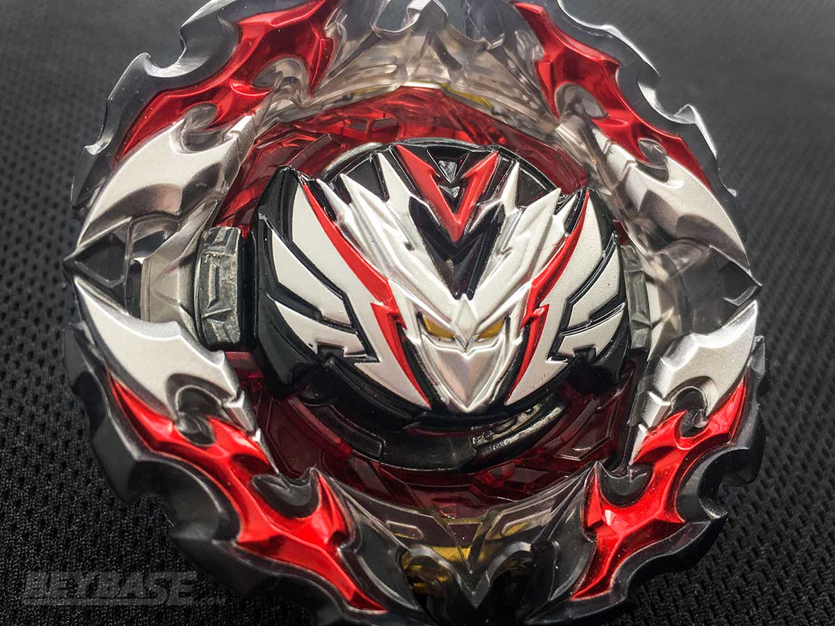 close up of red black and silver beyblade