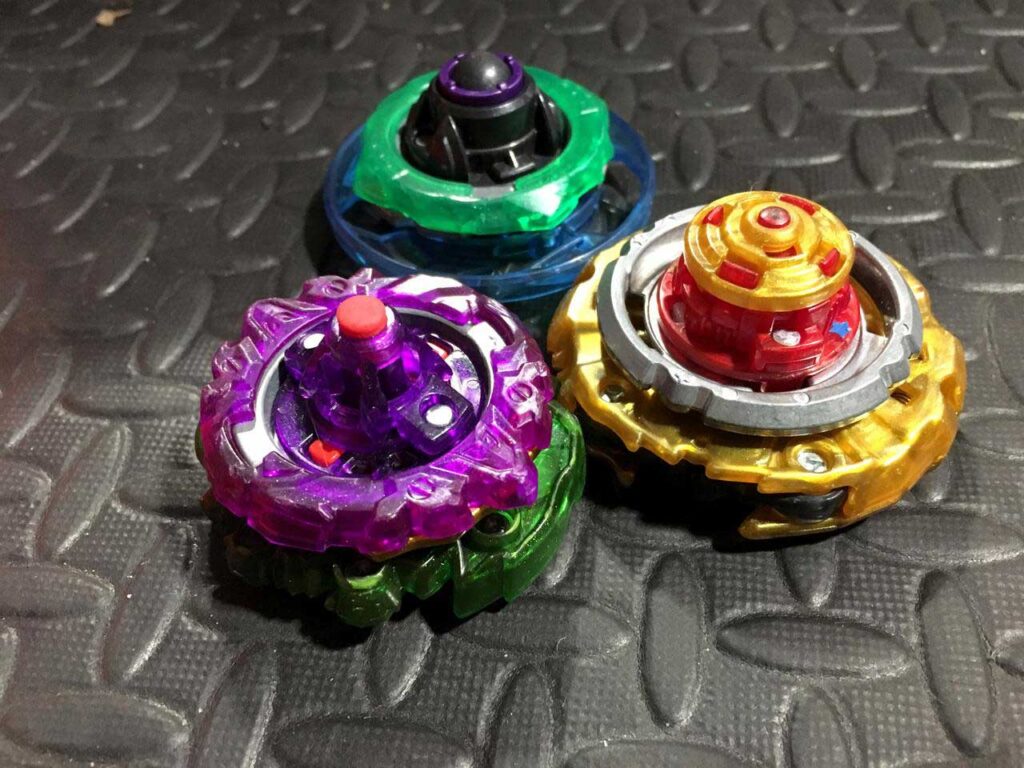 three beyblade burst tops